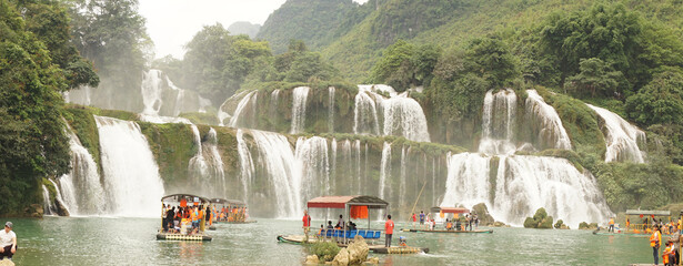 Ban Gioc Waterfall during public holiday with big crowds in Vietnam.