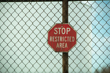 Stop restricted area signs