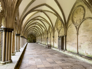 view along the Western cloister of Salisbury Cathedral, England.