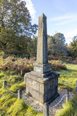 An obelisk opposite Speech House marking the traditional centre of the Forest of Dean,...