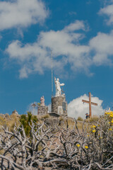 Monument to Christ the King on top of the Volcano Telapon 