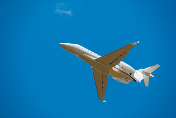 Small Jet  Airplane With Sky Background Taking Off