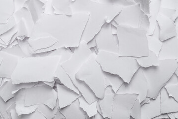 Empty white paper pieces as a background.