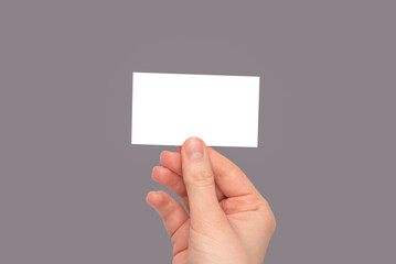 Empty card in woman hand. Copy space.