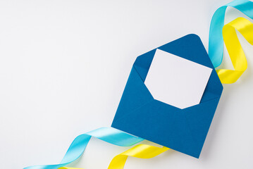 Stop the war in Ukraine concept. Top view photo of open blue envelope with letter over national flag colors yellow and blue curly ribbons on isolated white background with blank space