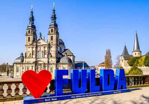 Fulda, Germany - March 24: love Fulda sign in front of the historic cathedral at the old town of Fulda on March 24, 2022