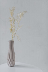 original vase with decor on a white table and background