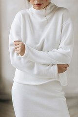 clothes close-up white. model girl. clothing brand. minimalism