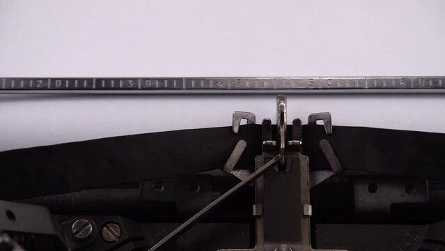 Typing phrase Snake Island, Ukraine on retro typewriter.