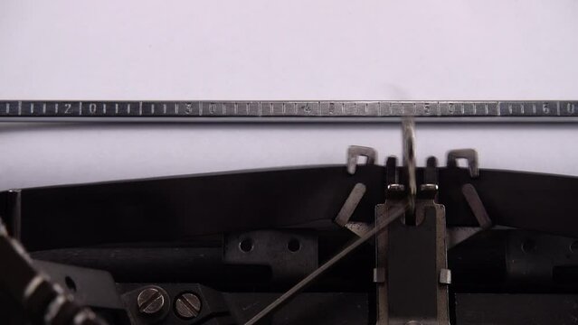 Typing phrase Stand with Ukraine ! on retro typewriter.