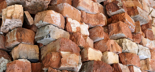 Weathered painted old brick wall background. Brickwork paint.