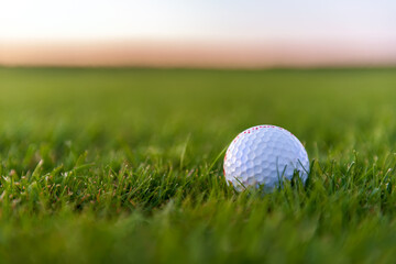Golf balls on artificial grass with blur background