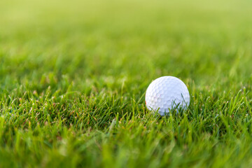 Golf balls on artificial grass with blur background