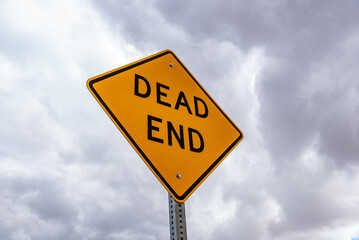 dead end sign in clouds