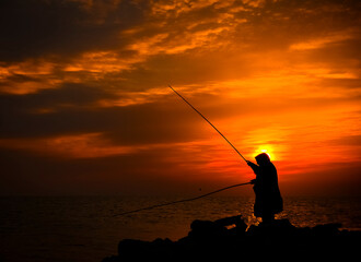the old fisherwoman at sunrise