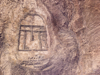 Traces of ancient Inca stone formations and campfires hidden on top of desolate mountains