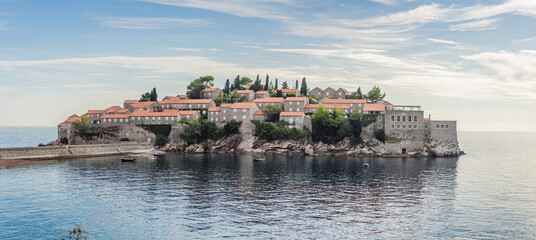 Fototapeta na wymiar Beautiful view of the island of St. Stephen, Sveti Stefan on the Budva Riviera, Budva, Montenegro