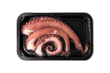 Vacuum packaging of fresh octopus tentacles for supermarket isolated on white background.