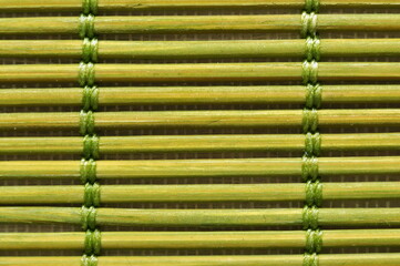 Closeup green bamboo wood placemat.