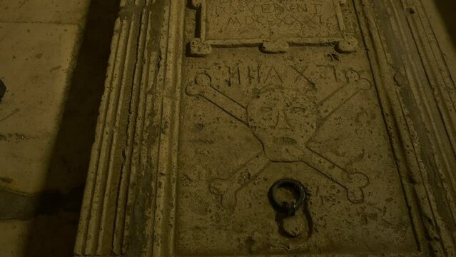 Tombstones on the floor of the Church of Saint Nicholas Muster on island Vis