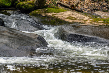 water cascadining over rocks in willard brook