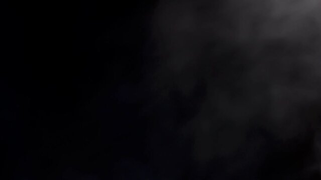 Video 4k of White smoke over black background for overlay design