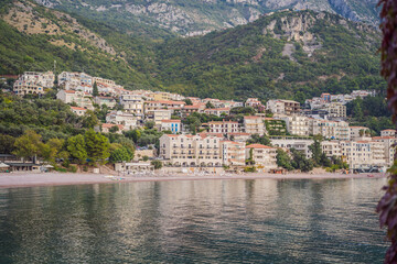 Fototapeta na wymiar Sveti Stefan beach in sunny summer day, Budva, Montenegro