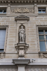 Obraz premium Architectural details of old buildings in Paris: The Criminal Court of Paris (Tribunal Correctionnel) at 14 Quai Goldsmiths. Paris. France.