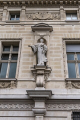 Obraz premium Architectural details of old buildings in Paris: The Criminal Court of Paris (Tribunal Correctionnel) at 14 Quai Goldsmiths. Paris. France.