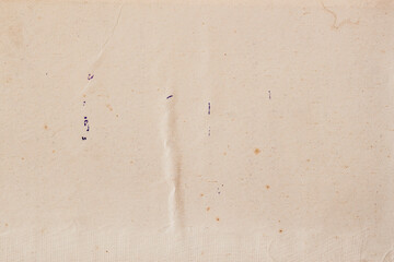Vintage kraft paper with wrinkles, stains, closeup texture