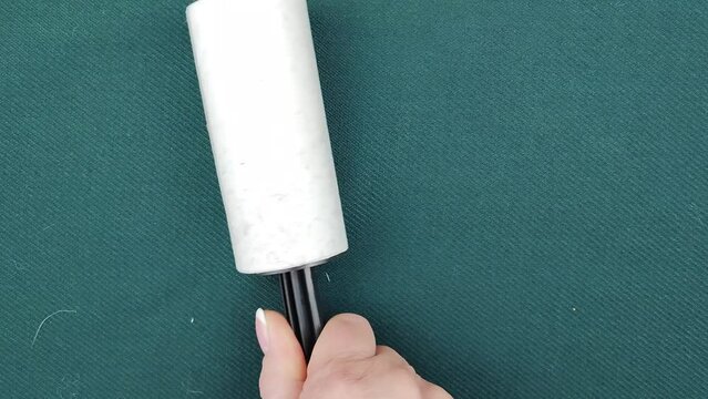 Sticky Sticky Roller. Household cleaning tool for getting rid of dander, hair, debris, pet hair and down.