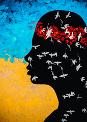 Ukrainian Girl with a national wreath on her head, against the background of the Ukrainian yellow and blue flag