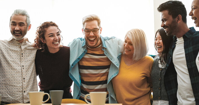 Happy Multiracial Friends Having Fun Together At Home Kitchen - Soft Focus On Asian Girl Face