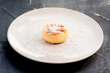 White dish with cheesecake. Delicious dessert. Cottage cheese food.