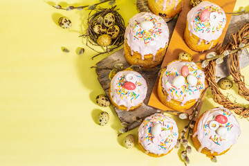 Traditional Easter cake. Festive sweet food with icing and decor. Eggs, nest, willow