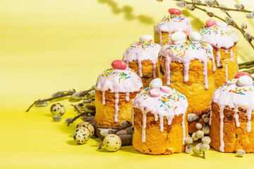 Traditional Easter cake. Festive sweet food with icing and decor. Eggs, nest, willow