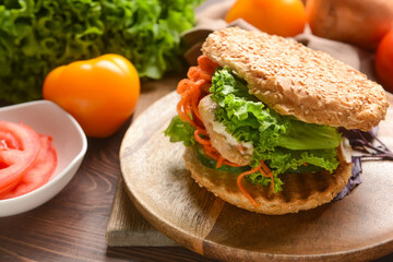 Fresh doner kebab in bun on table, closeup