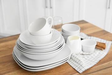 Set of clean tableware in  kitchen