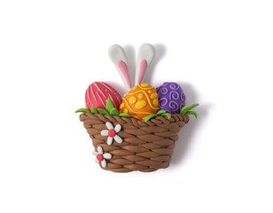 Basket design with Easter eggs and bunny ears. Handmade with plasticine. Isolated on white background. Top view. Flat lay