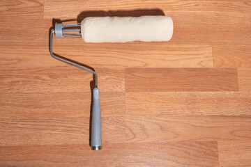 Clean unused paint roller with high nap for holding lots of liquid latex or oil based primer interior matte for DIY home walls projects