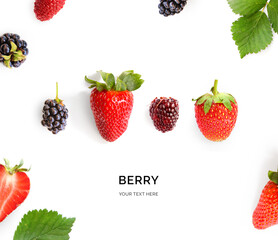 Creative layout made of strawberry and blackberry on a white background. Top view