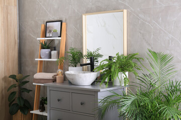 Modern bathroom interior with stylish vessel sink and beautiful green houseplants
