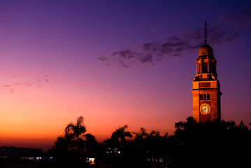 Naklejka premium Clock tower at sunset