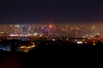 Fototapeta na wymiar Night view of Taichung City at Wanggaoliao Night View Park - Dadu Plateau Taichung, Taiwan
