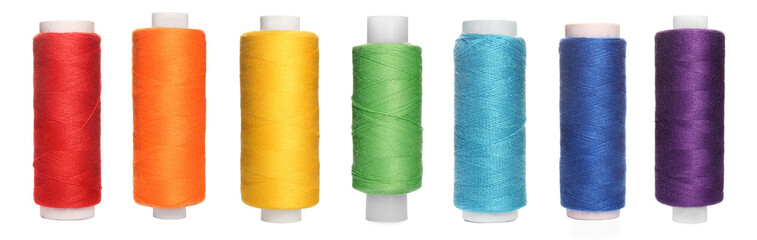Set with spools of multicolor on white background. Banner design