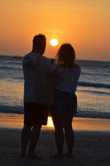 Fototapeta premium Sunsets awesome, different persons taking selfie pic outside, lifestyle happiness in couple