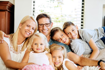 Obraz premium Together is when were happiest. Portrait of a happy family spending quality time together at home.