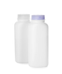 Bottles of dusting powder on white background, space for design. Baby cosmetic product