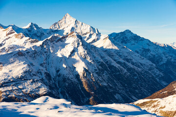 Fototapeta na wymiar Snow mountain in Switzerland near Zermatt on sunny day