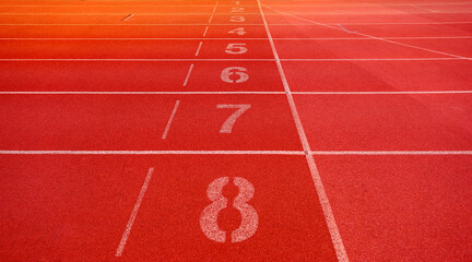 Outdoor stadium. Treadmill  tracks for running in a street stadium, close-up. Competition concept, finish or start